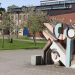 a building with a large sculpture in front of it